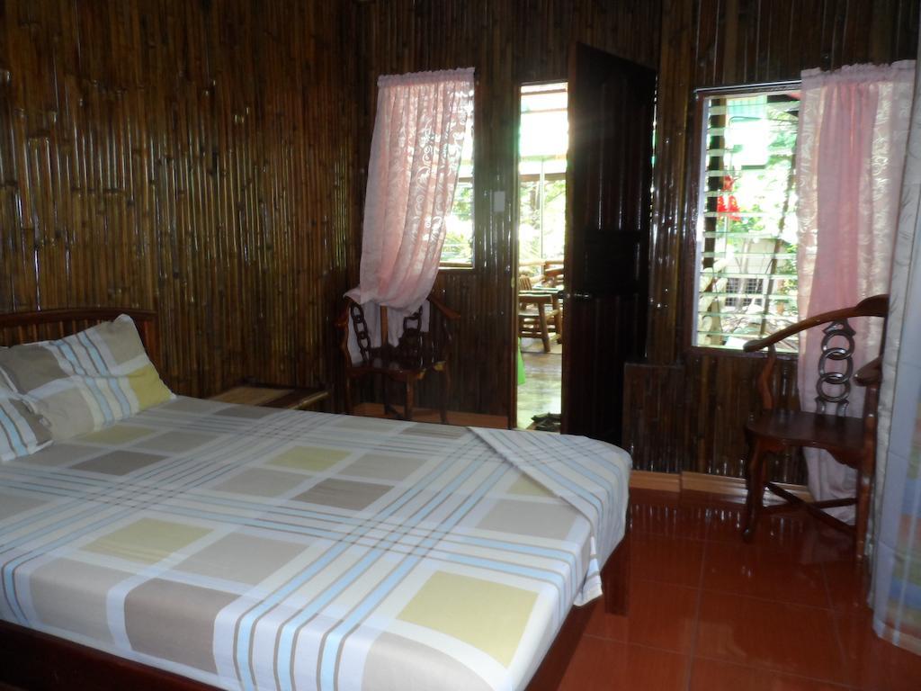 Victoria Guest House And Cottages Puerto Princesa ภายนอก รูปภาพ