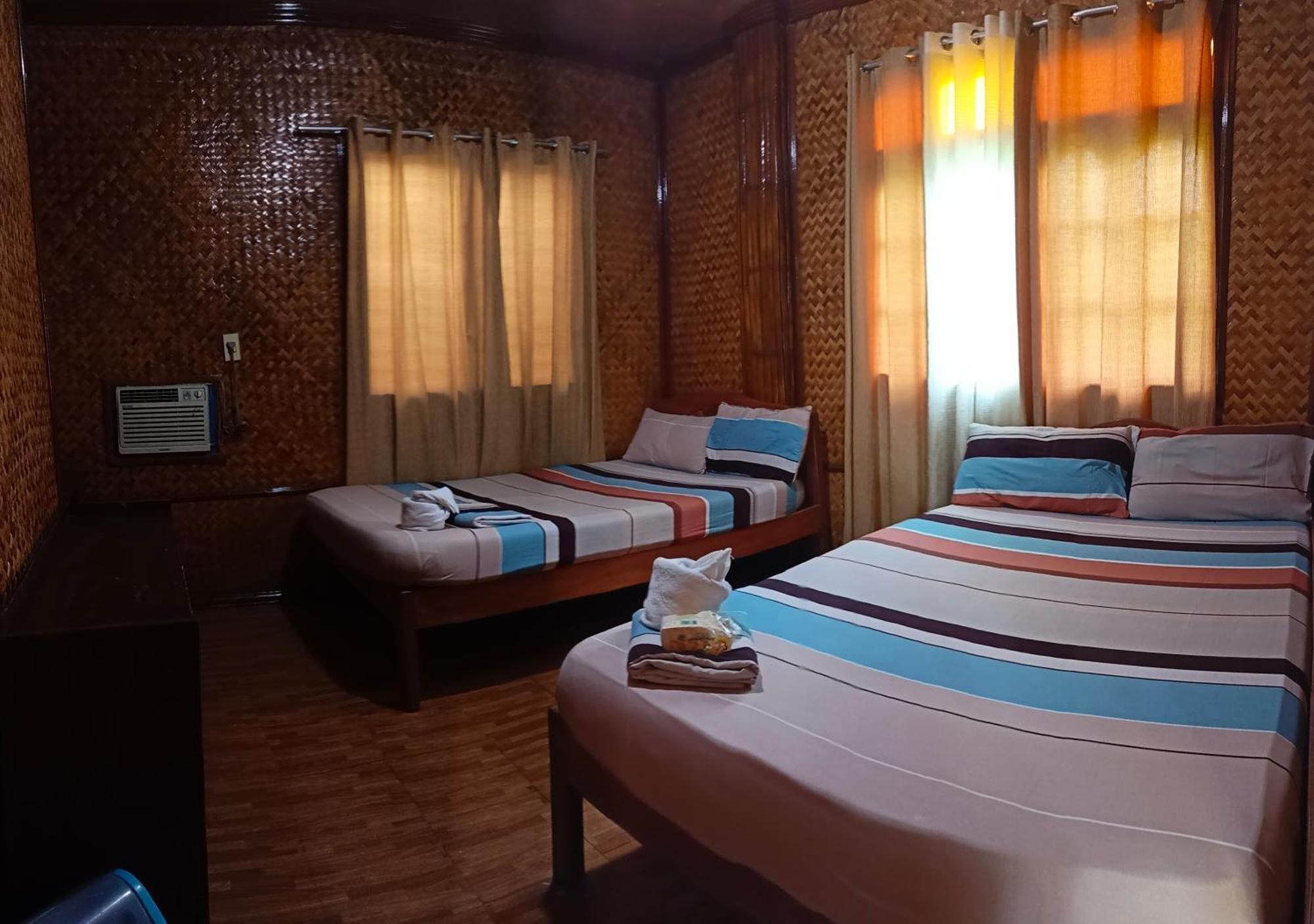 Victoria Guest House And Cottages Puerto Princesa ภายนอก รูปภาพ