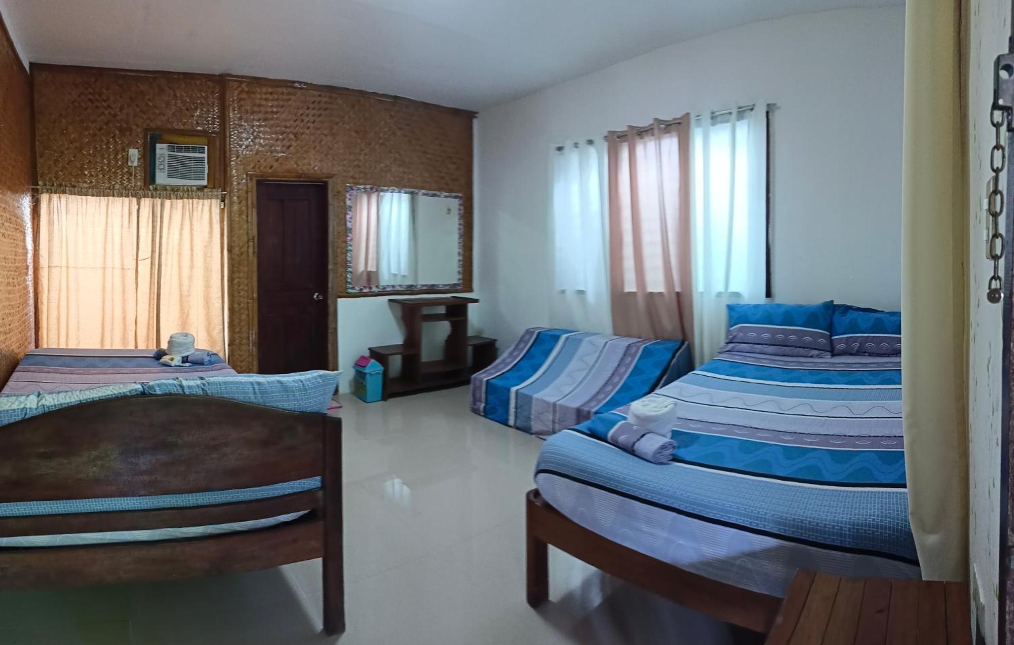 Victoria Guest House And Cottages Puerto Princesa ภายนอก รูปภาพ