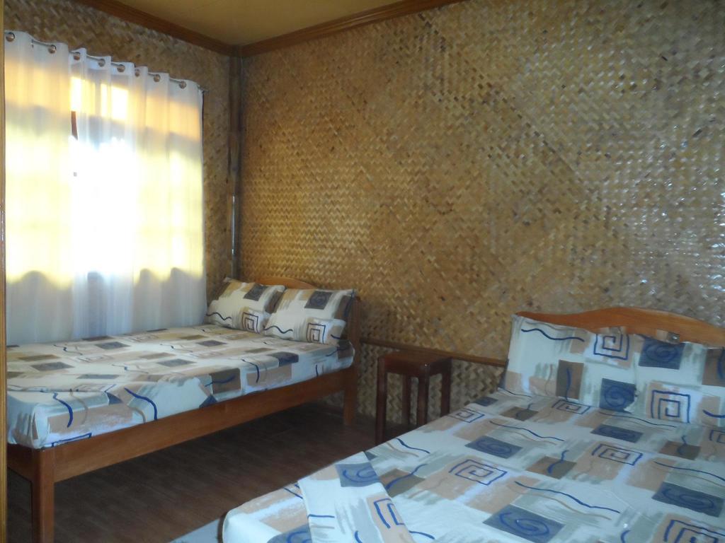 Victoria Guest House And Cottages Puerto Princesa ภายนอก รูปภาพ